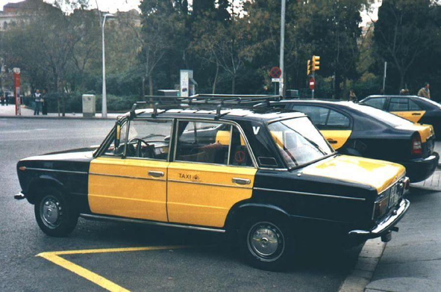 Vintage yellow and black Barcelona taxi